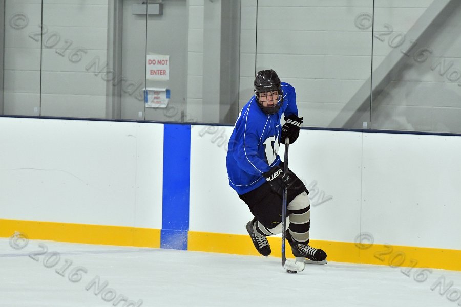 Wheaton College Men\'s Ice Hockey vs Middlesex Community College. - Photo By: KEITH NORDSTROM